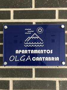 Apartamentos Olga Cantabria的证书、奖牌、标识或其他文件