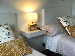 Apartamentos Olga Cantabria客房内的一张或多张床位
