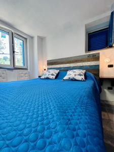 Cama o camas de una habitación en Casa Goletta a 100mt dal mare