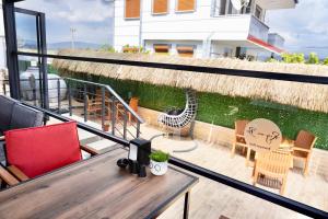 Photo de la galerie de l'établissement ReynaBe Boutique Hotel, à Dikili