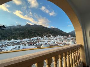 a view of a city from a balcony at Casa El Cerro in Cortes de la Frontera