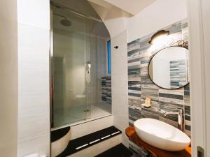 a bathroom with a sink and a shower at Le Terrazze 