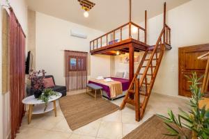 a room with a loft bed and a bedroom at Alchadef Park Apartment in Rhodes Town