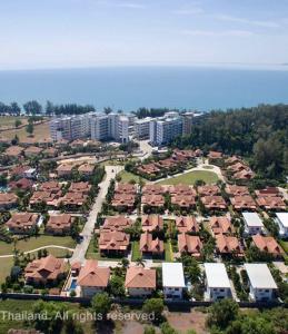 an aerial view of a resort with houses and buildings at AG Property in Mae Pim