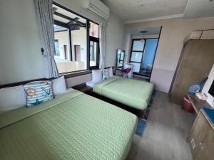 A bed or beds in a room at Fish's Home