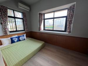 A bed or beds in a room at Fish's Home