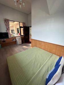 A bed or beds in a room at Fish's Home