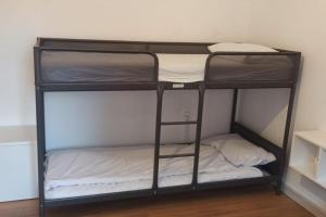 a couple of bunk beds in a room at Casa Anna Big House Near Lake Garda and Centre in Salò