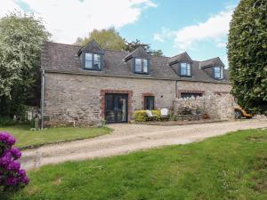 an old stone house on a dirt road at The Loft in Plymouth