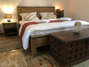 Postel nebo postele na pokoji v ubytování Hotel Hojari - Jabal Samhan, Salalah