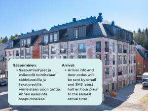 a building with a sign in front of it at Hiisi Homes Espoo Center in Espoo