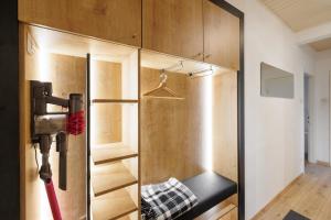 A television and/or entertainment centre at Cozy Apartment near Center Még 12 kép