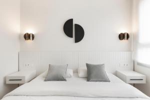 Posteľ alebo postele v izbe v ubytovaní Port Forum Apartments by Olala Homes
