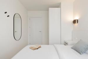 Posteľ alebo postele v izbe v ubytovaní Port Forum Apartments by Olala Homes