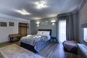 Postel nebo postele na pokoji v ubytování Álbero Hotel
