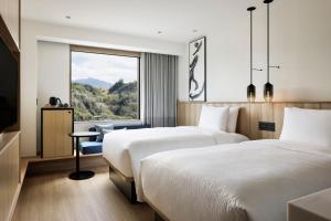 Katil atau katil-katil dalam bilik di Fairfield by Marriott Kagoshima Sakurajima