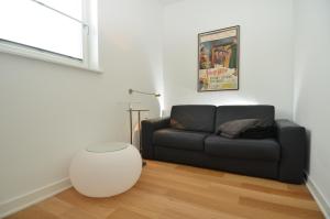 Posezení v ubytování Ostseeresidenz Sassnitz - Penthouse 19 mit Sauna, Balkon, Meerblick
