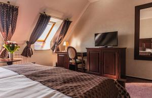 TV a/nebo společenská místnost v ubytování Hotel Octarna - Free parking