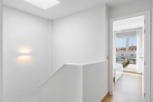 Łóżko lub łóżka w pokoju w obiekcie MEDANO4YOU Cabezo Residence