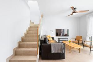 TV a/nebo společenská místnost v ubytování MEDANO4YOU Cabezo Residence