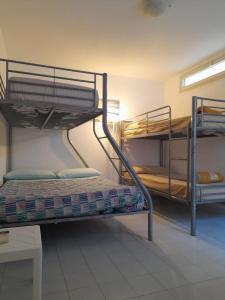Postel nebo postele na pokoji v ubytování Casamarina Orchidea