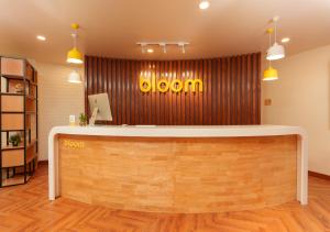 an office with a reception desk in a room at Bloom Boutique - Connaught Place Area in New Delhi