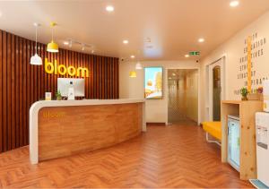 a lobby of a store with a reception desk at Bloom Boutique - Connaught Place Area in New Delhi