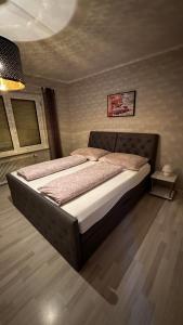 Postel nebo postele na pokoji v ubytování Ferienhaus Lara