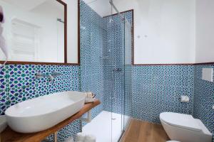 Koupelna v ubytování YourHome - Relais Loggia Li Galli