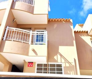 a view of a building with a balcony at Adeje House 2 bedrooms, Wifi Free in Adeje