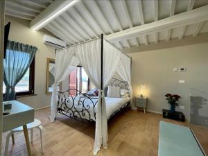 Postel nebo postele na pokoji v ubytování B&B La Fenice