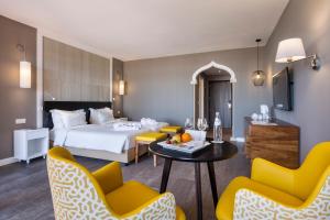 Кровать или кровати в номере AP Oriental Beach - Adults Friendly
