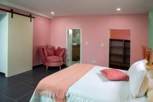 Ένα ή περισσότερα κρεβάτια σε δωμάτιο στο Paradiso Apartments - 1 BDR