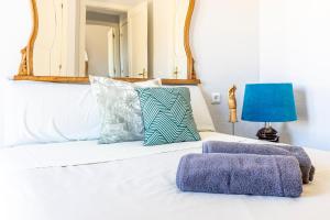 מיטה או מיטות בחדר ב-La casa de Jacobo