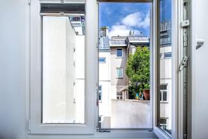 an open window with a view of a city at Cozy apartment Studio in Vienna