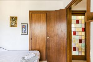 Posteľ alebo postele v izbe v ubytovaní Sant Antoni