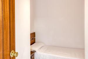 Posteľ alebo postele v izbe v ubytovaní Sant Antoni