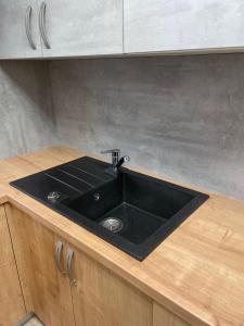 Kuchyň nebo kuchyňský kout v ubytování Apartma Ivana + 5 fotografií