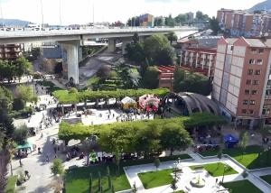 an aerial view of a city with a bridge at Bilbao Urban City in Bilbao