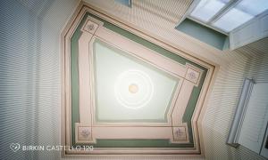 a room with a ceiling with a window in it at Albergo Diffuso Birkin Castello in Cagliari