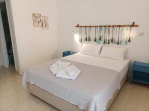 Cama ou camas em um quarto em Bella Terra Nature Living