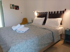 Cama ou camas em um quarto em Bella Terra Nature Living
