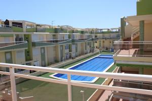 The swimming pool at or close to Delfines III Solo Familias Serviplaya