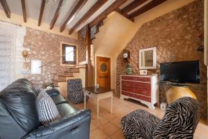 TV a/nebo společenská místnost v ubytování Casa del Sol