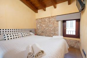 Postel nebo postele na pokoji v ubytování Casa del Sol