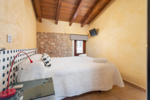 Postel nebo postele na pokoji v ubytování Casa del Sol