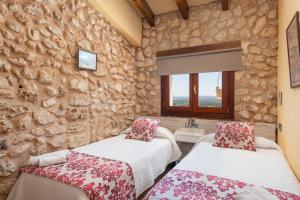 Postel nebo postele na pokoji v ubytování Casa del Sol + 37 fotografií
