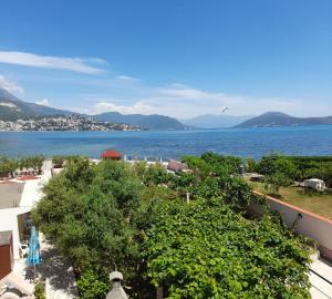 a view of the ocean from a building at Apartments Maxi Katić in Herceg-Novi