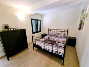 Llit o llits en una habitació de Casa Aguamarin Playa Roca