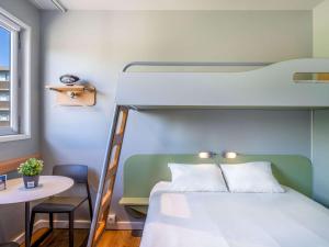 Tempat tidur susun dalam kamar di Ibis Budget Barcelona Viladecans